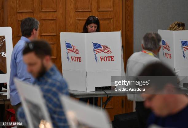 People cast their votes at a polling location during the midterm elections in Charlotte, NC, United States on November 8, 2022