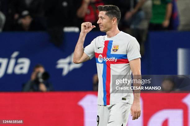 Barcelona's Polish forward Robert Lewandowski reacts as he is expulsed from the pitch after receiving a second yellow card during the Spanish league...