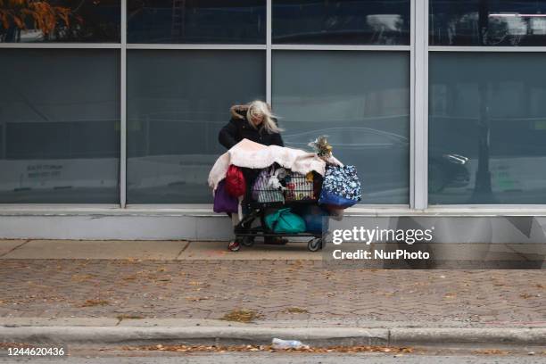 Homeless woman on a street of Chicago, Illinois, United States, on October 17, 2022.
