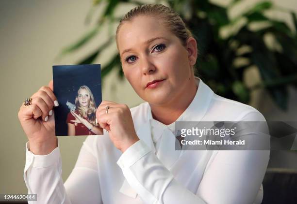 Virginia Roberts Giuffre, with a photo of herself as a teen, when she says she was abused by Jeffrey Epstein, Ghislaine Maxwell and Prince Andrew,...