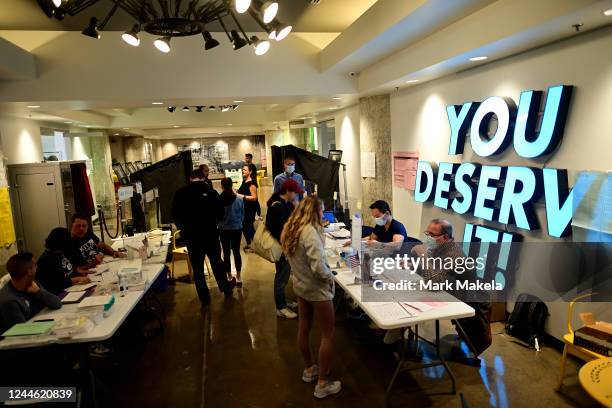 Voters arrive to cast their ballots at the Arts and Crafts Holdings polling location on November 8, 2022 in Philadelphia, Pennsylvania. After months...