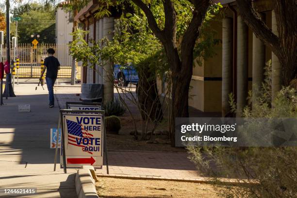 Vote Here" sign outside a polling location in Tucson, Arizona, US, on Tuesday, Nov. 8, 2022. After months of talk about reproductive rights, threats...