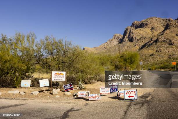 Campaign signs near a polling location in Tucson, Arizona, US, on Tuesday, Nov. 8, 2022. After months of talk about reproductive rights, threats to...