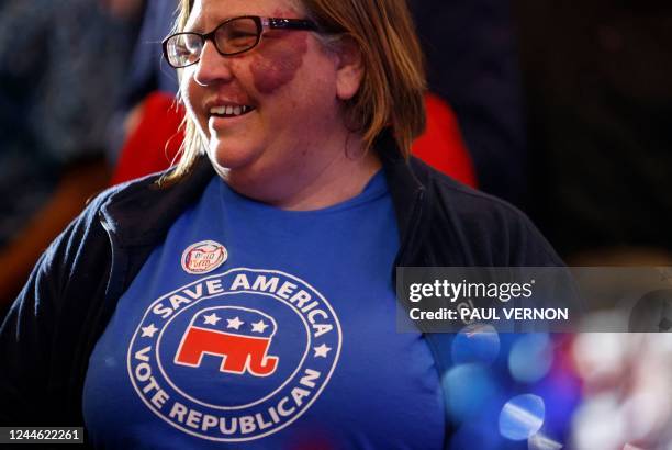 Amy Sutherly of Marysville, Ohio, wears a t-shirt with the Republican elephant symbol as she talks to another guest during the Ohio Republican Party...