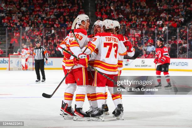 Adam Ruzicka, Tyler Toffoli and Elias Lindholm celebrate with Nazem Kadri who scored the first goal of the first period of the game against the New...