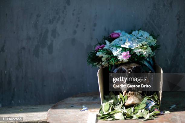 Skull is seen in the floor of Central Cemetery on November 8, 2022 in La Paz, Bolivia. "Las Ñatitas" is a traditional festivity celebrated every year...