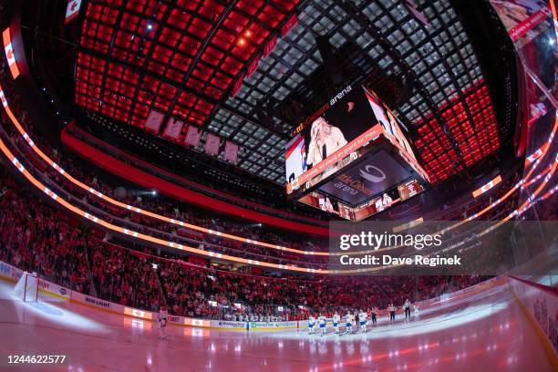 The starting line ups for the Montreal Canadiens and the Detroit Red Wings take the ice for the National Anthem before the start of an NHL game at...