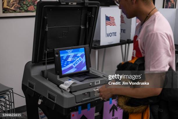 Voter casts their ballot at the Hillel Foundation on November 8, 2022 in Madison, Wisconsin. After months of candidates campaigning, Americans are...