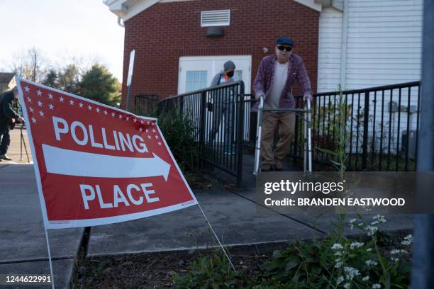 Voters leave their polling place in Lancaster County, Pennsylvania, after casting their ballots in the midterm elections on November 8, 2022.