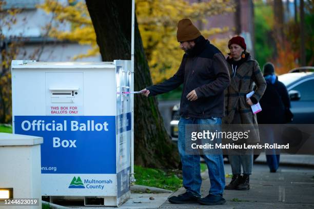 Voters cast their ballots at official ballot boxes on November 8, 2022 in Portland, Oregon. The state's mail-in ballots allow Oregonians to fill out...