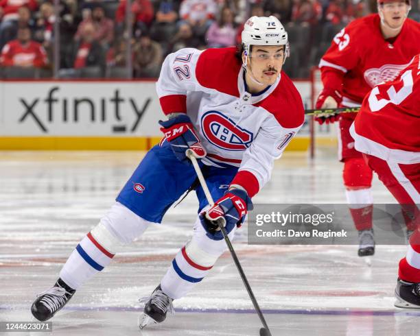 Arber Xhekaj of the Montreal Canadiens skates up ice with the puck during the second period of an NHL game against the Detroit Red Wings at Little...