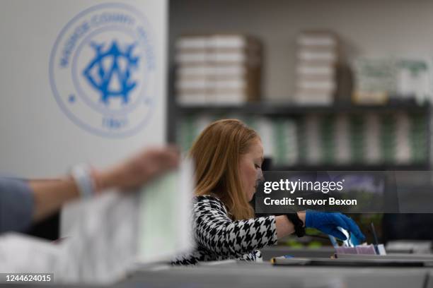 Election officials sort mail-in ballots at the Washoe County Registrar of Voters Office on November 8, 2022 in Reno, Nevada. After months of...