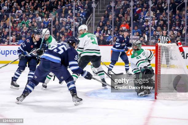 Mark Scheifele of the Winnipeg Jets redirects the puck behind goaltender Scott Wedgewood of the Dallas Stars for a second period goal at the Canada...