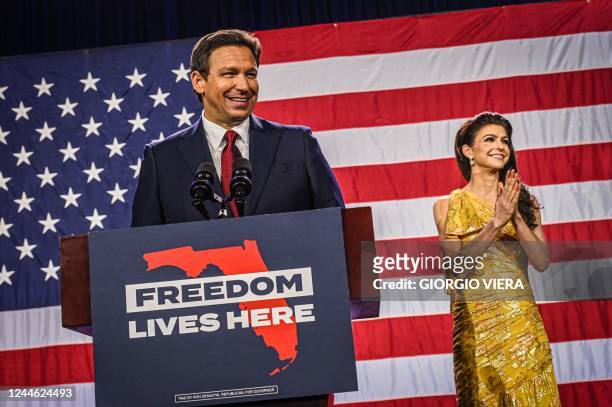 Republican gubernatorial candidate for Florida Ron DeSantis with his wife Casey DeSantis speaks to supporters during an election night watch party at...