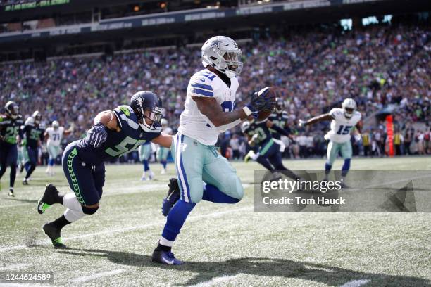 Seattle Seahawks linebacker Mychal Kendricks chases Dallas Cowboys running back Ezekiel Elliott during an NFL game between the Seattle Seahawks and...