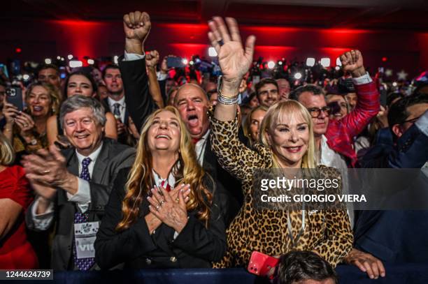 Supporters of Republican gubernatorial candidate for Florida Ron DeSantis cheer during an election night watch party at the Convention Center in...