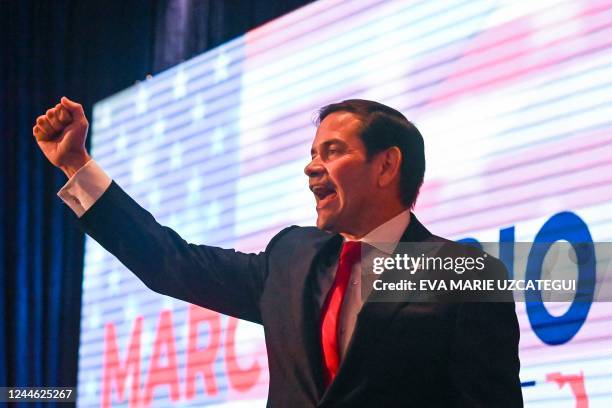 Senator Marco Rubio raises his fist during his election night watch party at Hilton Miami Airport Blue Lagoon in Miami, Florida, on November 8, 2022.