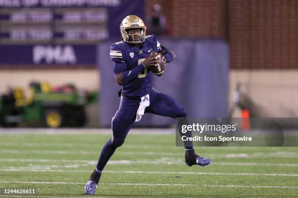 Akron Zips quarterback DJ Irons scrambles during the first quarter of the college football game between the Eastern Michigan Eagles and Akron Zips on...