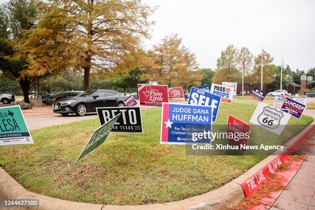 Election signs are seen outside a polling station in Plano, Texas, the United States, on Nov. 8, 2022. Concerned voters across the United States cast...