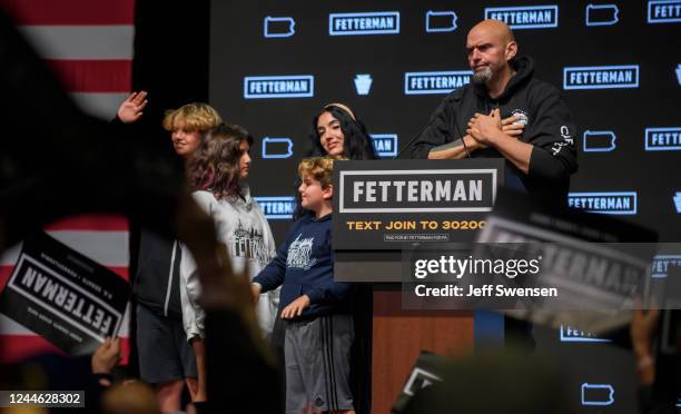 Democratic Senate candidate John Fetterman speaks to supporters with his family during an election night party at StageAE on November 9, 2022 in...
