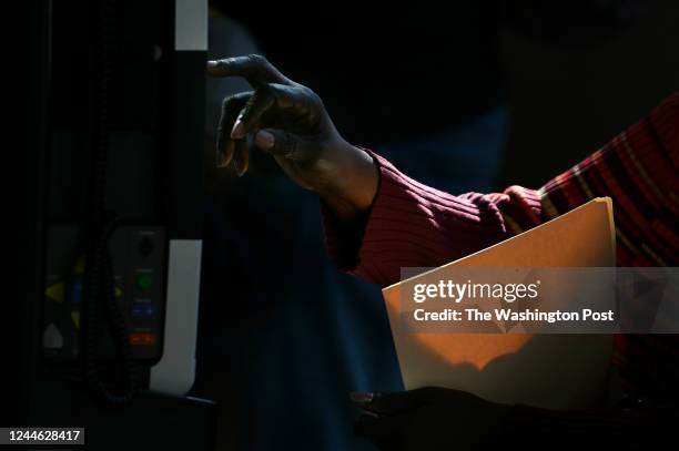 Voter casts her vote at a voting machine at Riggs Lasalle Recreation Center in Washington, D.C., November 8 during midterm election day. DC Mayor...