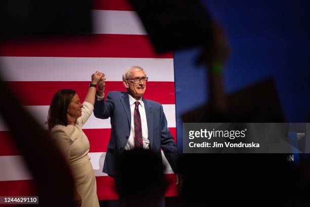 Gov. Tony Evers celebrates on stage during an election night event at The Orpheum Theater on November 8, 2022 in Madison, Wisconsin. Democratic...