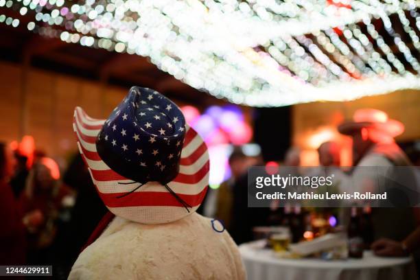 Supporter wears a hat in the colors of the American flag at an election night party for of Republican gubernatorial candidate Christine Drazan on...