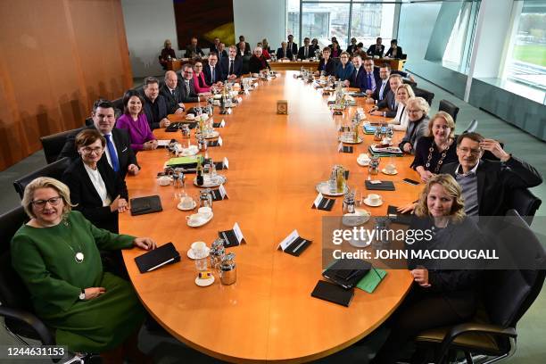 Members of the German cabinet pose for a group picture ahead a weekly meeting of the German cabinet at the chancellery in Berlin on November 9, 2022.