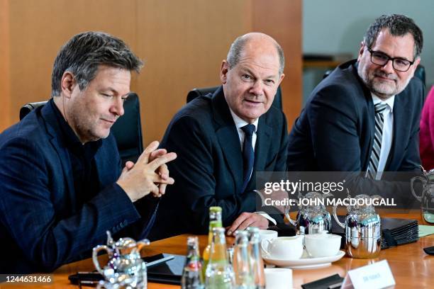 German Minister of Economics and Climate Protection Robert Habeck, German Chancellor Olaf Scholz and German Chief of Staff Wolfgang Schmidt attend...