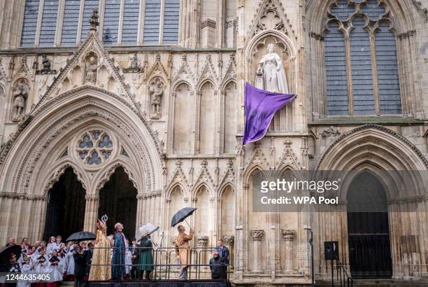 King Charles III, next to Camilla, Queen Consort, unveils the statue of Queen Elizabeth II outside York Minster, where they will also meet people...