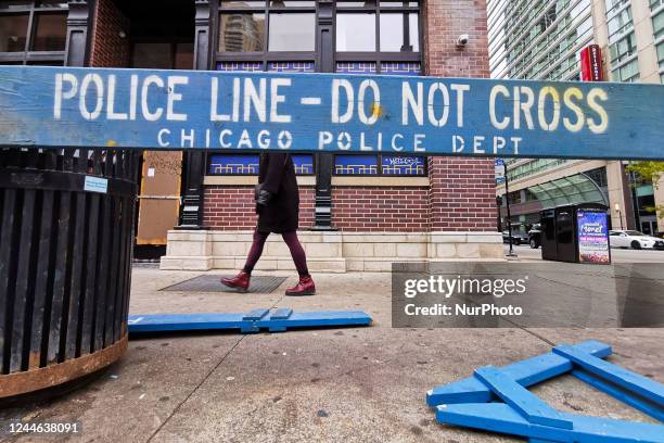 Police Line - Do Not Cross board sign is seen in Chicago, Illinois, United States, on October 18, 2022.
