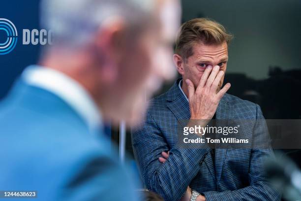 Randy Florke, right, looks on as his husband Democratic Congressional Campaign Committee Chair Rep. Sean Patrick Maloney, D-N.Y., speaks during a...