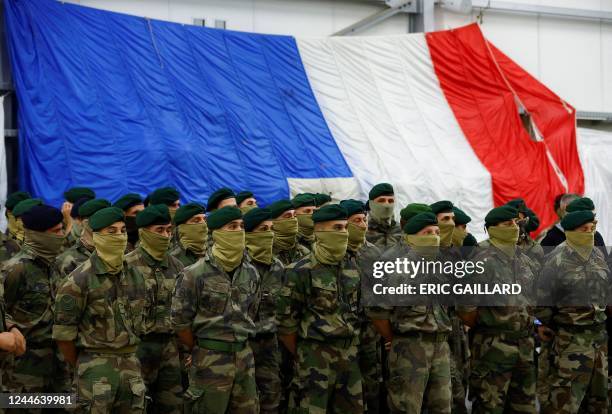 Soldiers of the French Commando Hubert, a special forces unit of the French Navy, wait prior to the arrival of French President in...