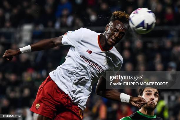 Roma's British forward Tammy Abraham scores a header during the Italian Serie A football match between Sassuolo and AS Rome on November 9, 2022 at...