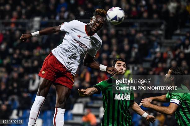 Roma's British forward Tammy Abraham scores a header during the Italian Serie A football match between Sassuolo and AS Rome on November 9, 2022 at...