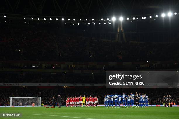 Teams observe a minutes silence for Armistice Day ahead of the English League Cup third round football match between Arsenal and Brighton and Hove...