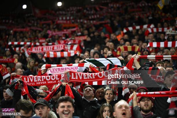Liverpool fans sing ahead of the English League Cup third round football match between Liverpool and Derby County at Anfield in Liverpool, north west...