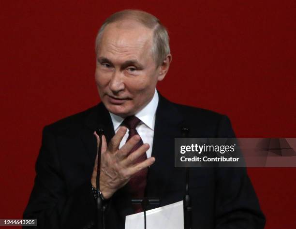 Russian President Vladimir Putin gestures during the award ceremony marking the 75th anniversary of Russia's Federal Medical-Biological Agency at the...
