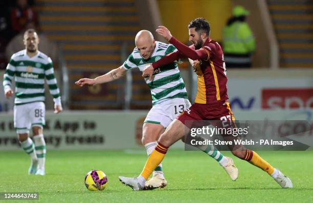 Celtic's Aaron Mooy and Motherwell's Sean Goss battle for the ball during the cinch Premiership match at Fir Park, Motherwell. Picture date: Tuesday...