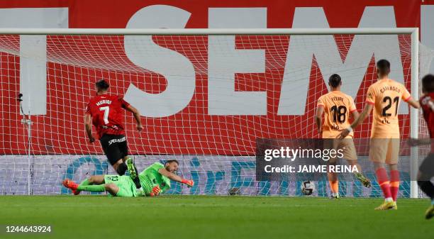 Mallorca's Kosovar forward Vedat Muriqi celebrates scoring his team's first goal during the Spanish League football match between RCD Mallorca and...