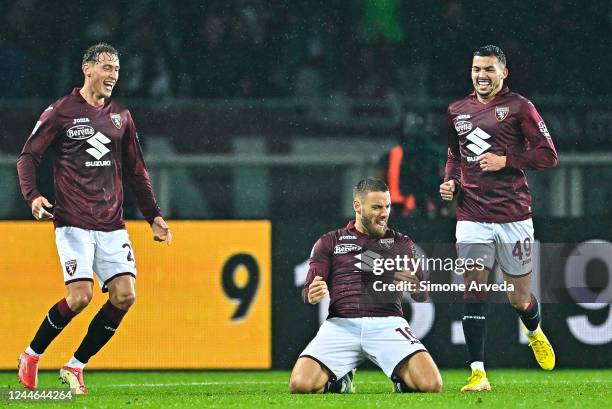 Nikola Vlasic of Torino celebrates with his team-mates Mergim Vojvoda and Nemanja Radonjic after scoring a goal during the Serie A match between...