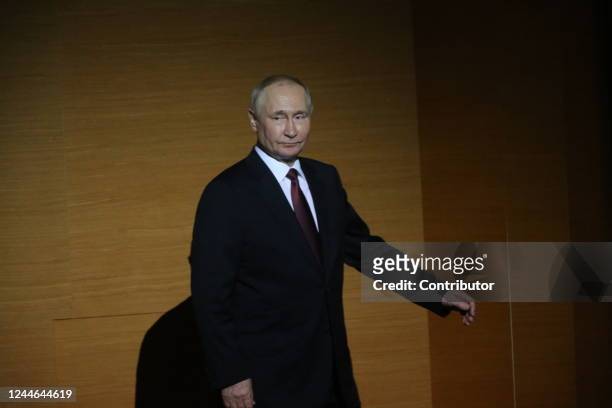 Russian President Vladimir Putin leaves the scene during the award ceremony marking the 75th anniversary of Russia's Federal Medical-Biological...