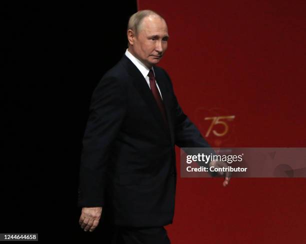 Russian President Vladimir Putin leaves the scene during the award ceremony marking the 75th anniversary of Russia's Federal Medical-Biological...