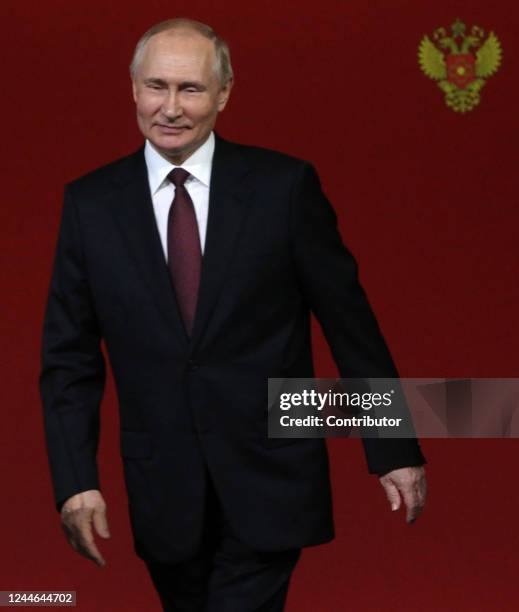 Russian President Vladimir Putin smiles during the award ceremony marking the 75th anniversary of Russia's Federal Medical-Biological Agency at the...