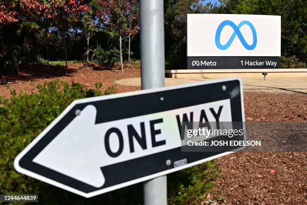 One way sign is seen in front of Meta corporate headquarters in Menlo Park, California on November 09, 2022. - Facebook owner Meta will lay off more...