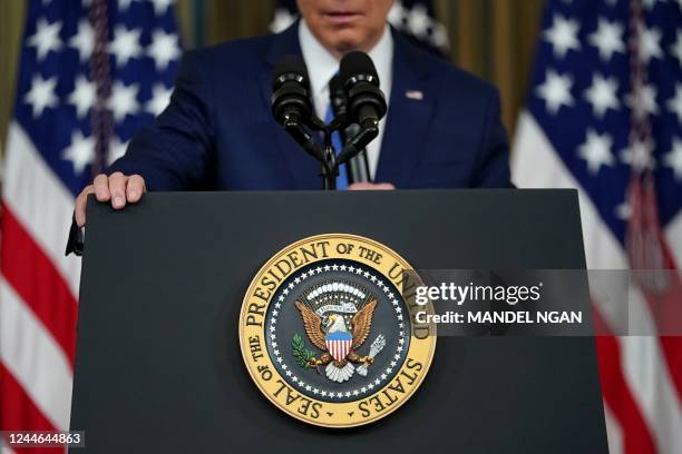 The Presidential Seal is seen as US President Joe Biden speaks during a press conference a day after the US midterm elections, from the State Dining...