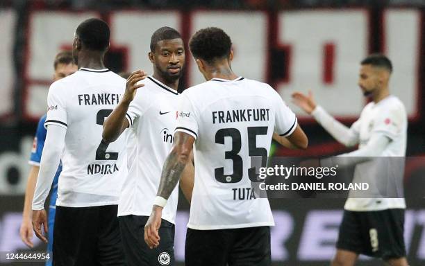 Frankfurt's French defender Almamy Toure and Frankfurt's Brazilian defender Tuta celebrate after the German first division Bundesliga football match...