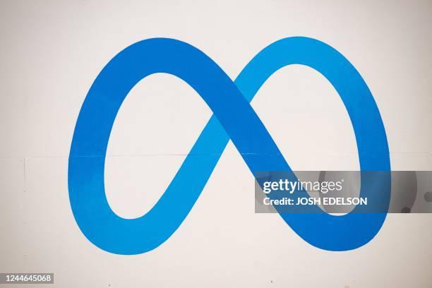 The logo for Meta is seen on a sign at the company's corporate headquarters location in Menlo Park, California on November 9, 2022. - Facebook owner...