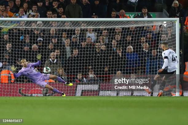 Caoimhin Kelleher of Liverpool saves Conor Hourihane of Derbys penalty during the Carabao Cup Third Round match between Liverpool and Derby County at...