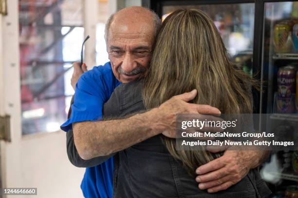 Altadena , CA Betty Trujillo, El Monte, hugs Joe Chahayed, owner of Joe's Service Center in Altadena CA. Wednesday, Nov 9, 2022. Chahayed received $1...